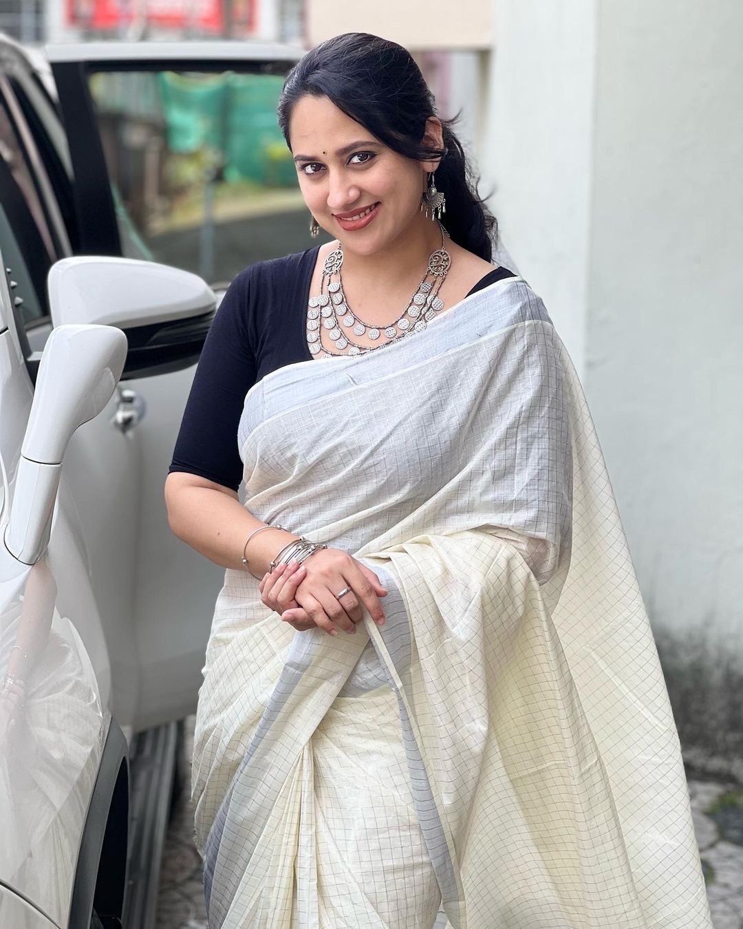 Malayalam Actress Miya George Stills in White Saree Black Blouse